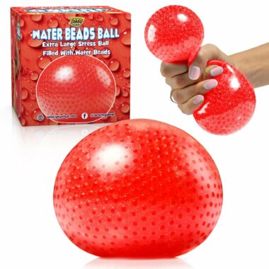 An extra large red stress ball from YoYa Toys. The toy's packaging at the top with a hand squeezing on one.