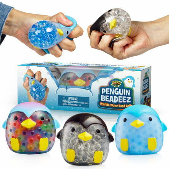Three Penguin Beadeez squishy stress balls with their packaging. The image also shows a pair of hands squeezing the balls.
