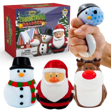 Three Christmas squishy stress ball toys in festive designs of Santa Claus, a snowman & a reindeer with their packaging.